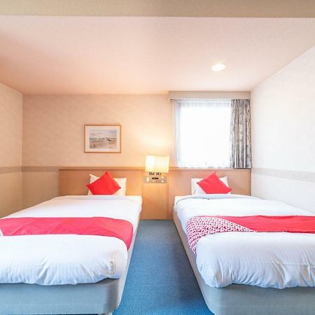 Oyo Business Hotel Nishiura Йоккаити Экстерьер фото