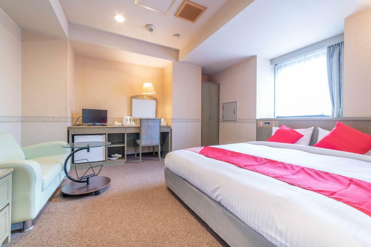 Oyo Business Hotel Nishiura Йоккаити Экстерьер фото