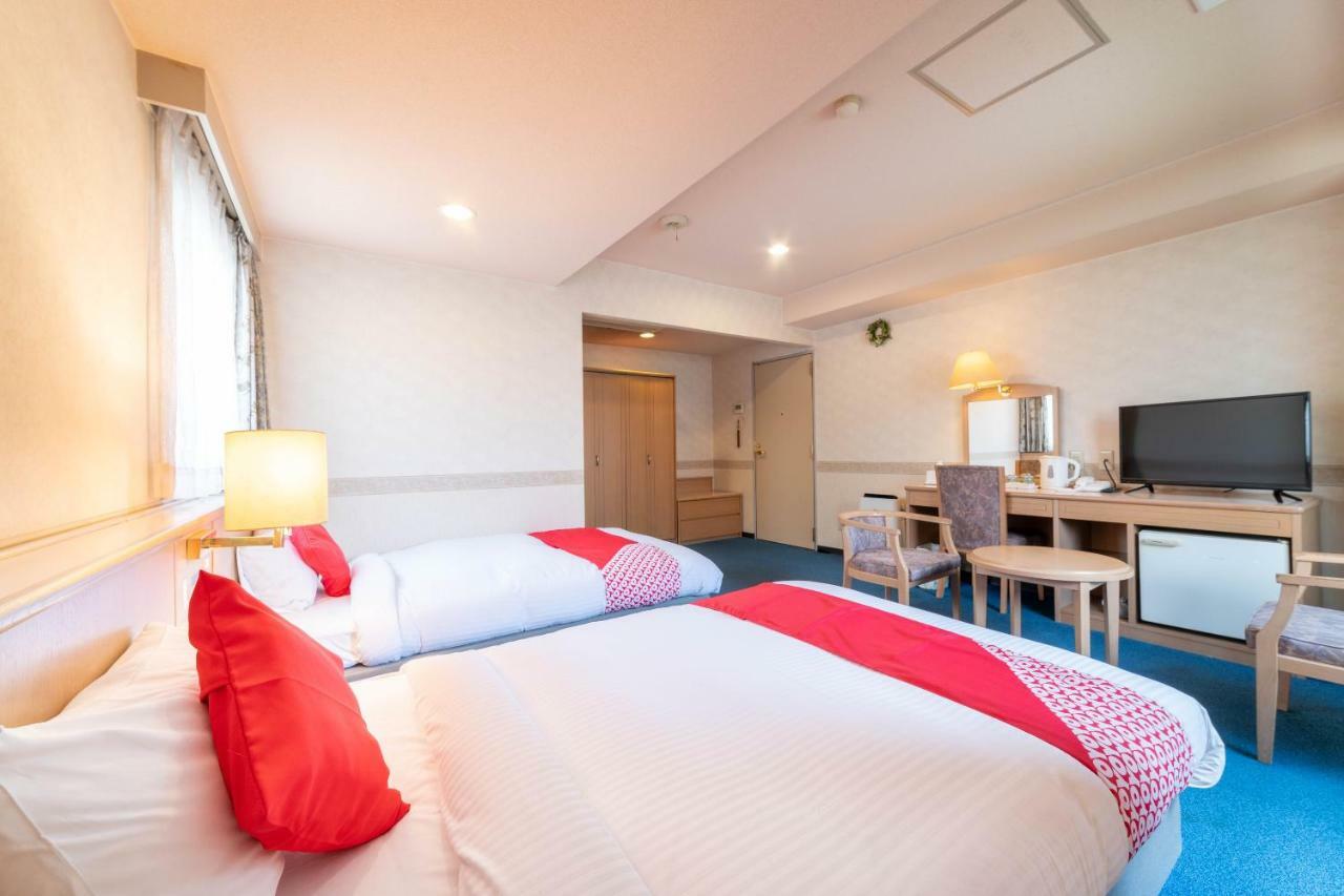 Oyo Business Hotel Nishiura Йоккаити Экстерьер фото