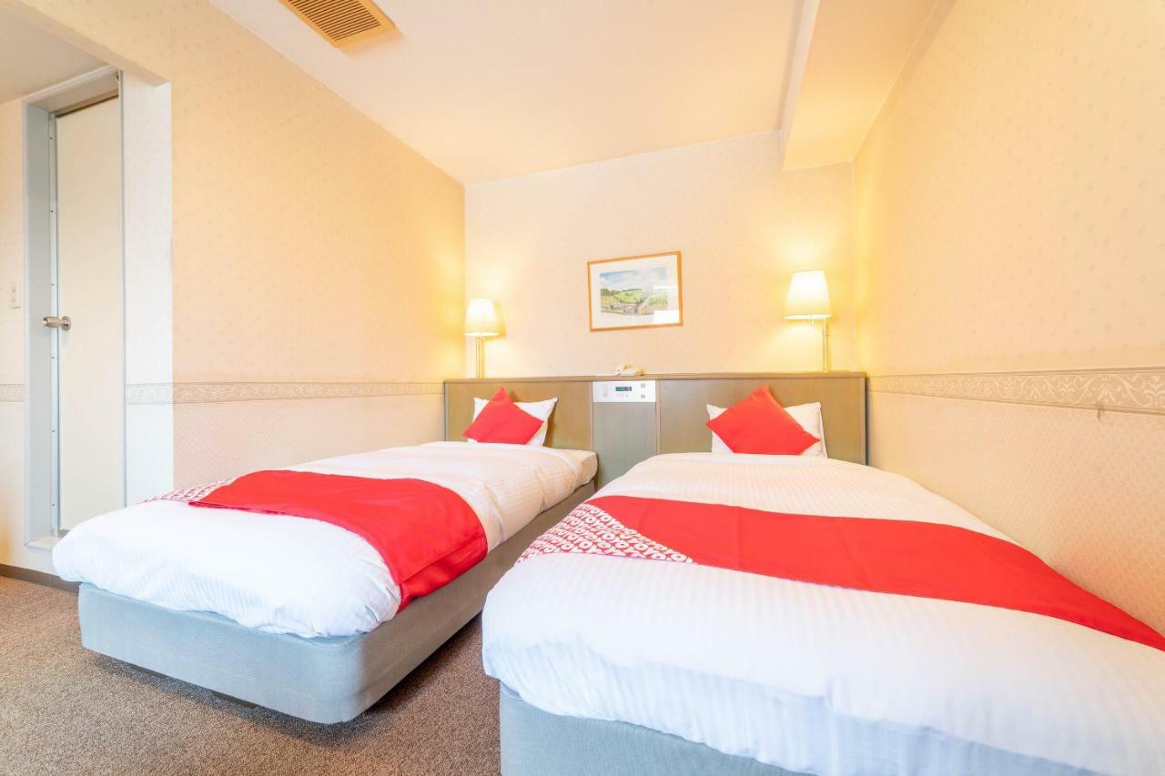 Oyo Business Hotel Nishiura Йоккаити Экстерьер фото
