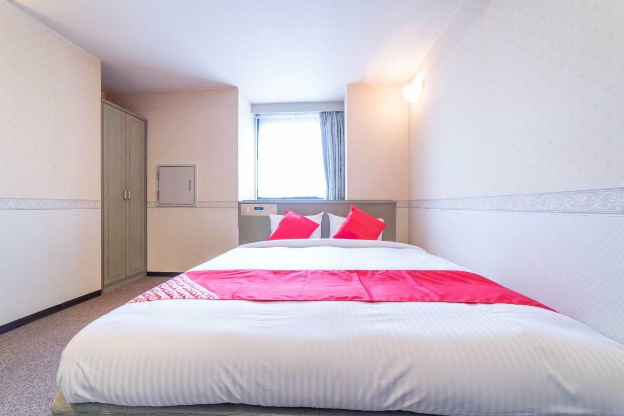 Oyo Business Hotel Nishiura Йоккаити Экстерьер фото
