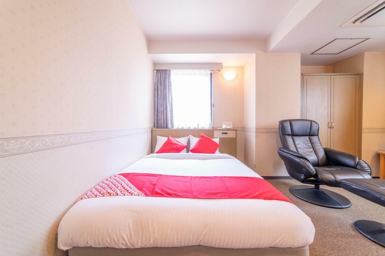 Oyo Business Hotel Nishiura Йоккаити Экстерьер фото