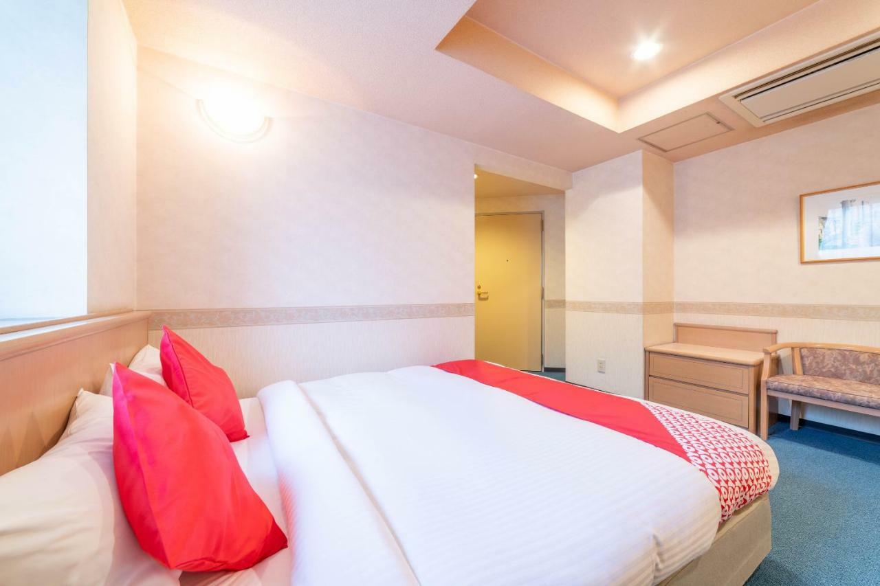 Oyo Business Hotel Nishiura Йоккаити Экстерьер фото