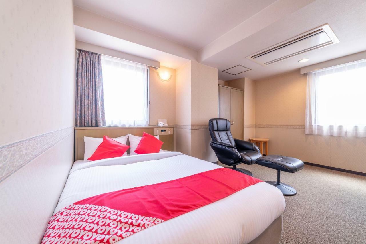 Oyo Business Hotel Nishiura Йоккаити Экстерьер фото