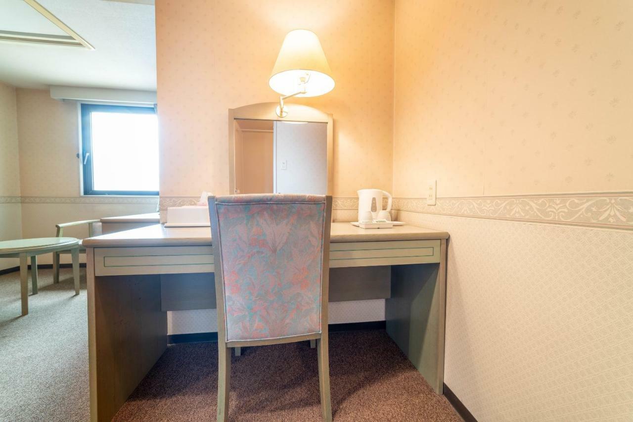 Oyo Business Hotel Nishiura Йоккаити Экстерьер фото