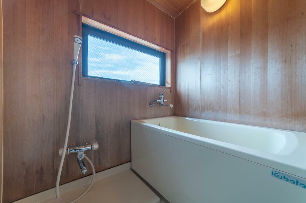 Oyo Business Hotel Nishiura Йоккаити Экстерьер фото