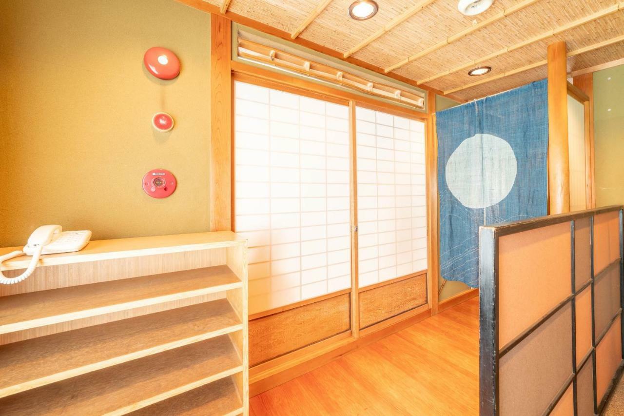 Oyo Business Hotel Nishiura Йоккаити Экстерьер фото