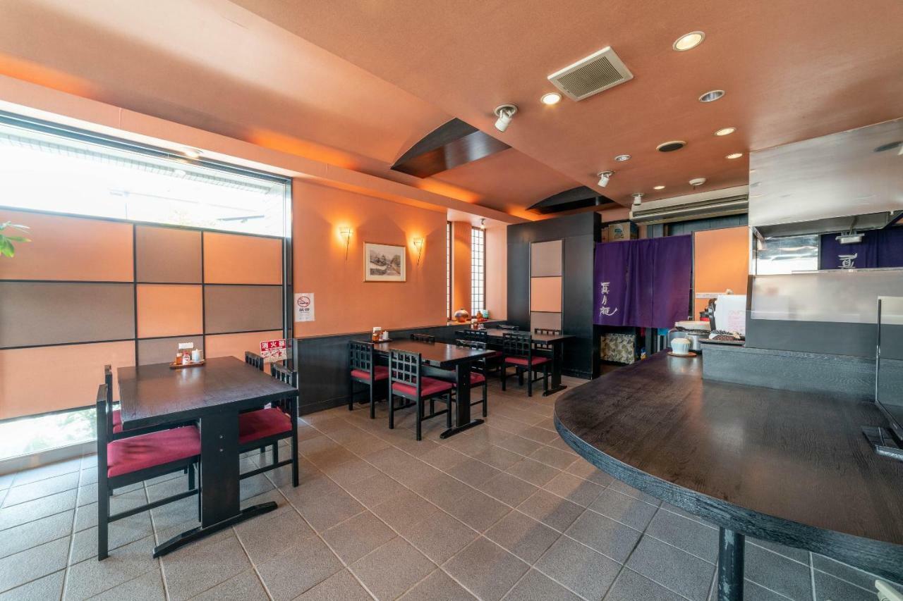 Oyo Business Hotel Nishiura Йоккаити Экстерьер фото